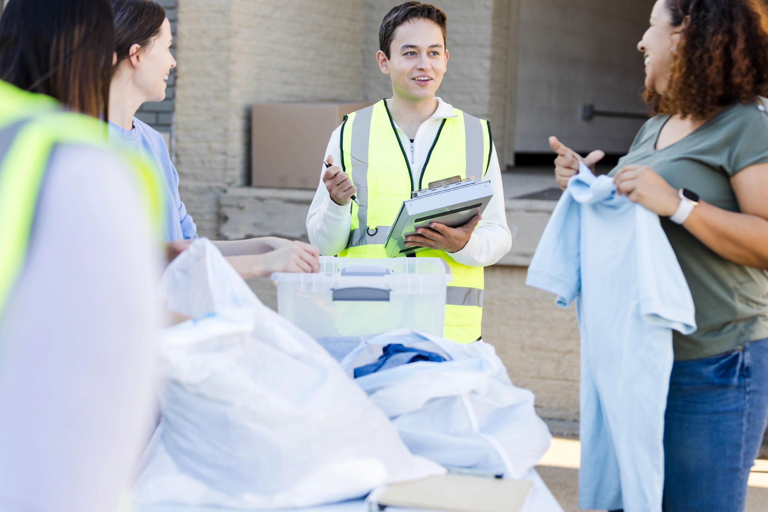 Team member holding a clipboard