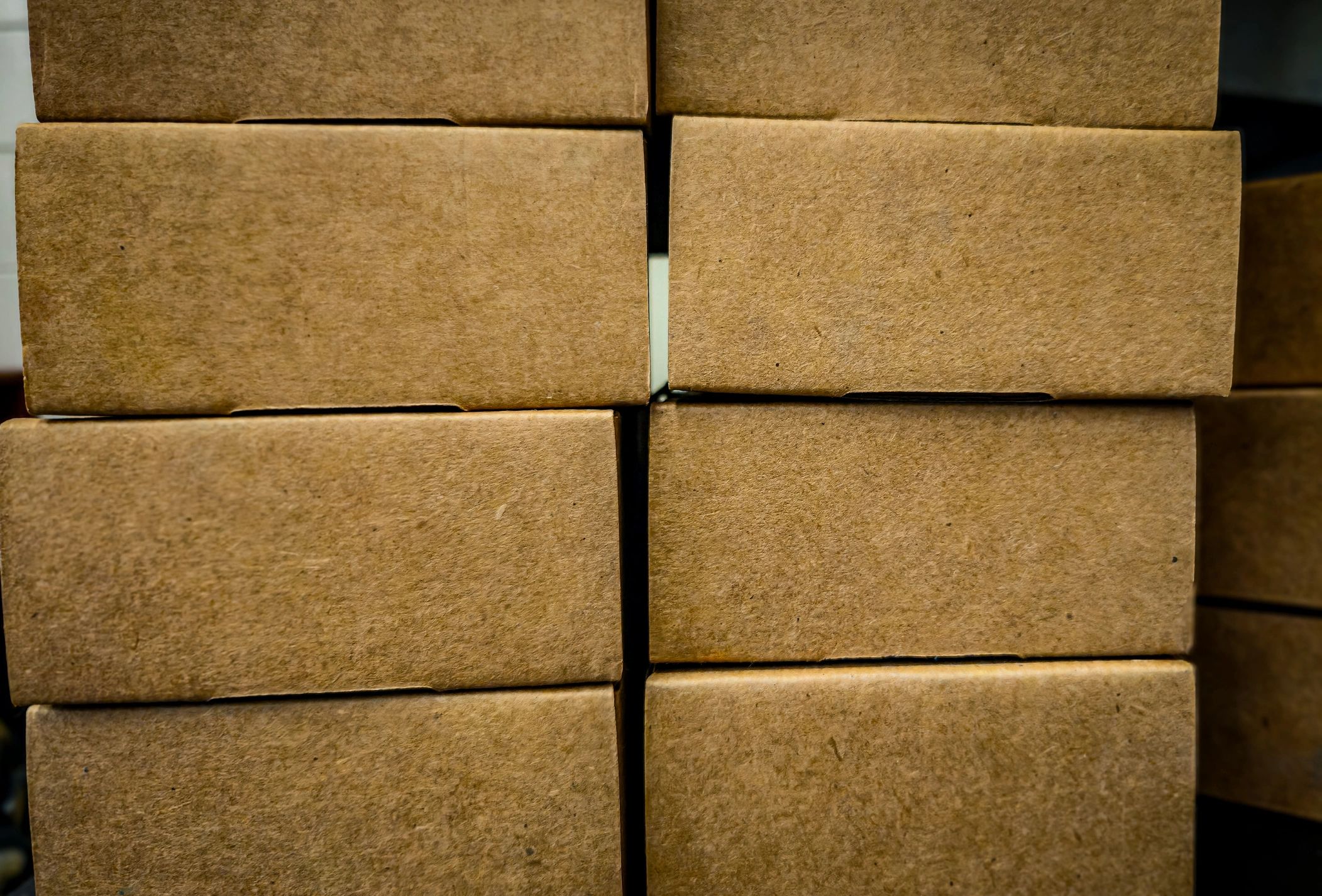 Stacked cardboard boxes representing recyclable paper and cardboard